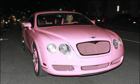 Paris Hilton in an impossible to ignore Pink Bentley